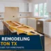 Bright modern kitchen under renovation in Houston TX with unfinished cabinets and tools, showing ongoing remodeling work.